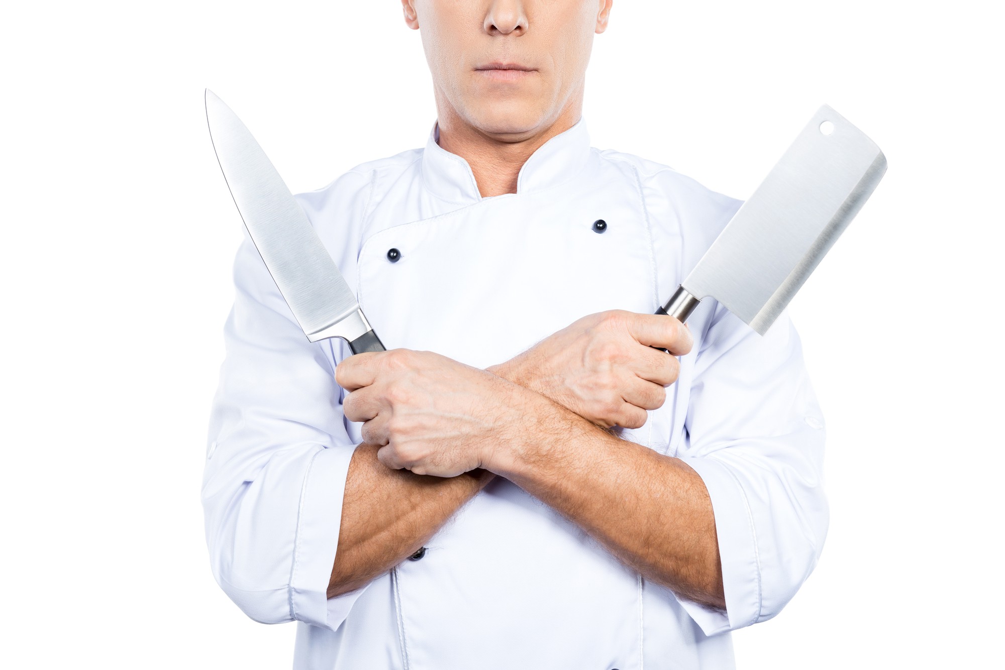 Chef che mostra una tecnica con coltello